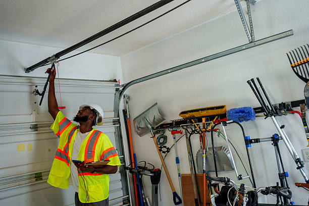 Professional Garage Door Installation technician working in Vadnais Heights, MN